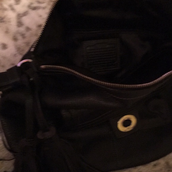 Leather coach bag with tassel accent. Zips closed - Picture 3 of 3